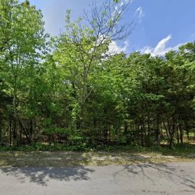 0.57ac Embraced by Lakes for only $130/mo for 48/mo in Izard County, AR